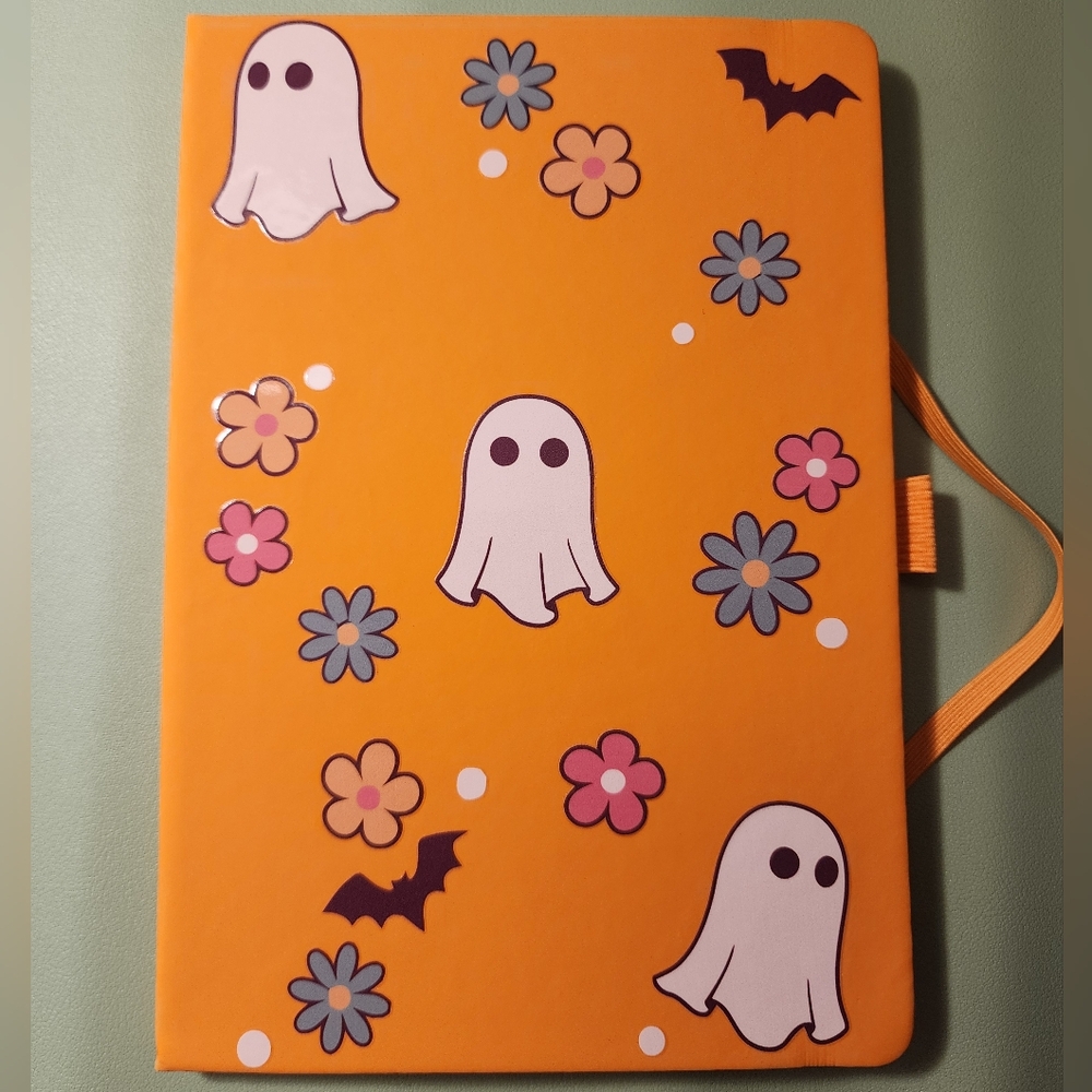 Orange Journal with Ghost and Flower Design and Pen